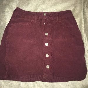 High waisted maroon button up skirt